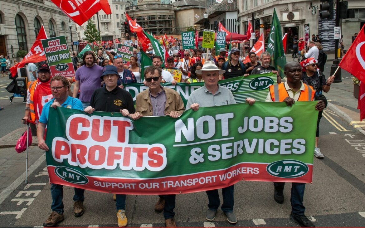 Striking hospital workers turn up at RMT rally in show of support for rail  staff