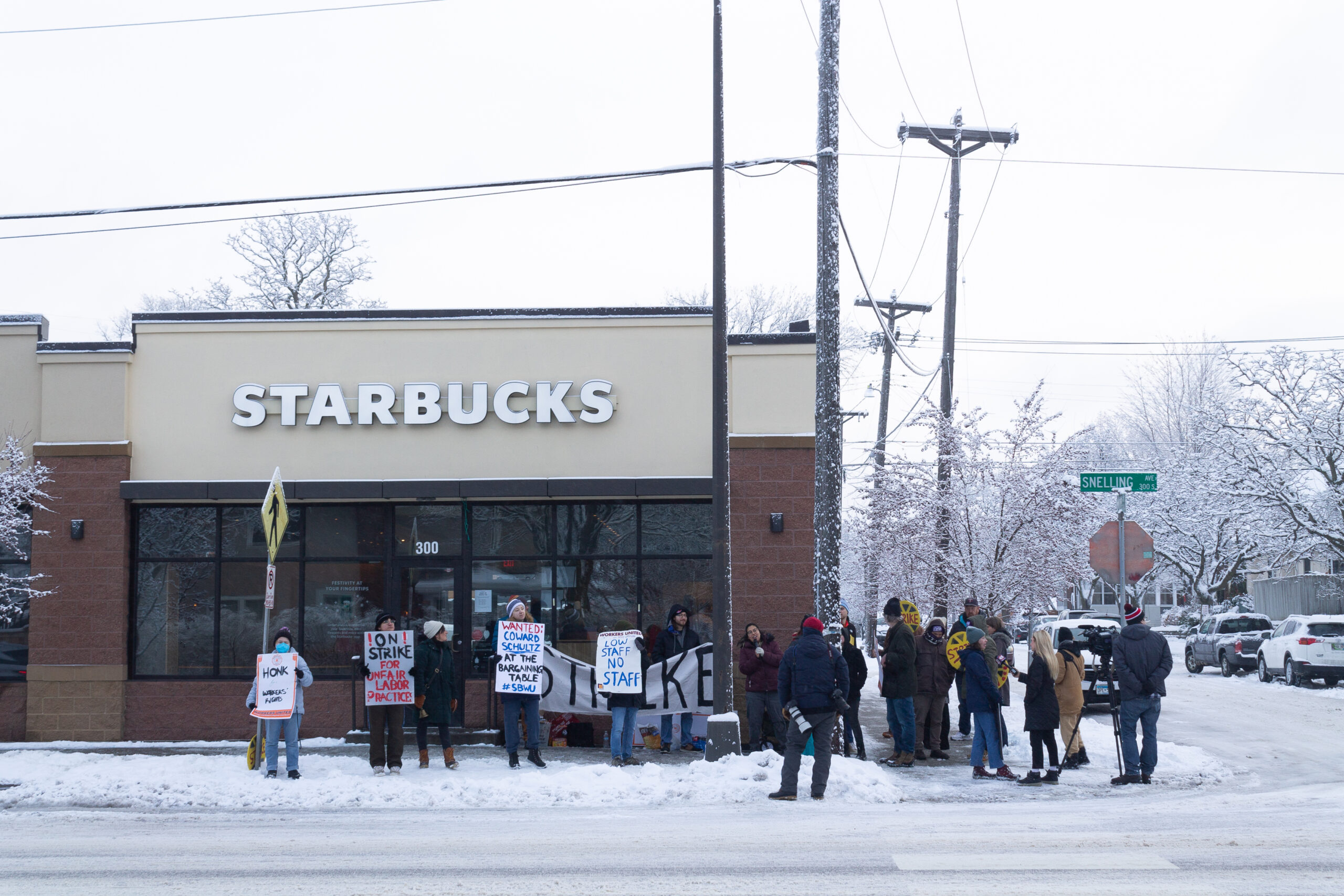 Starbucks workers on strike on outside of a shop in St. Paul, Minnesota.