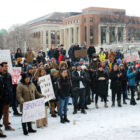On February 20, a crowd of graduate workers and supporters form for a rally outside Coffman Memorial Union to announce union drive.