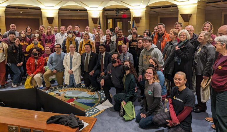 UMN workers and other PELRA advocates pose for a photo together at the Minnesota State Capitol.