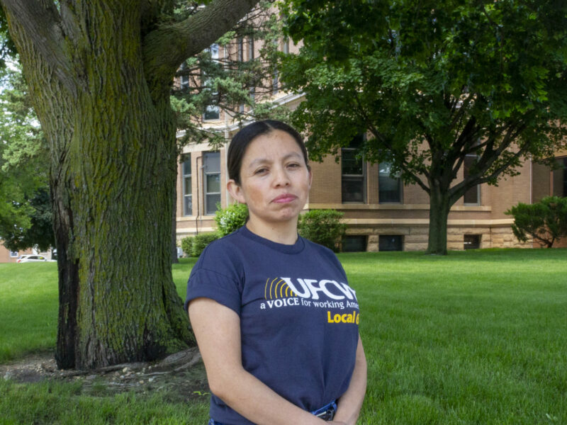 Dina Velasquez Escalante, a meat packer and union steward, poses for a portrait in St. James, Minn., while repping her union, UFCW Local 663.