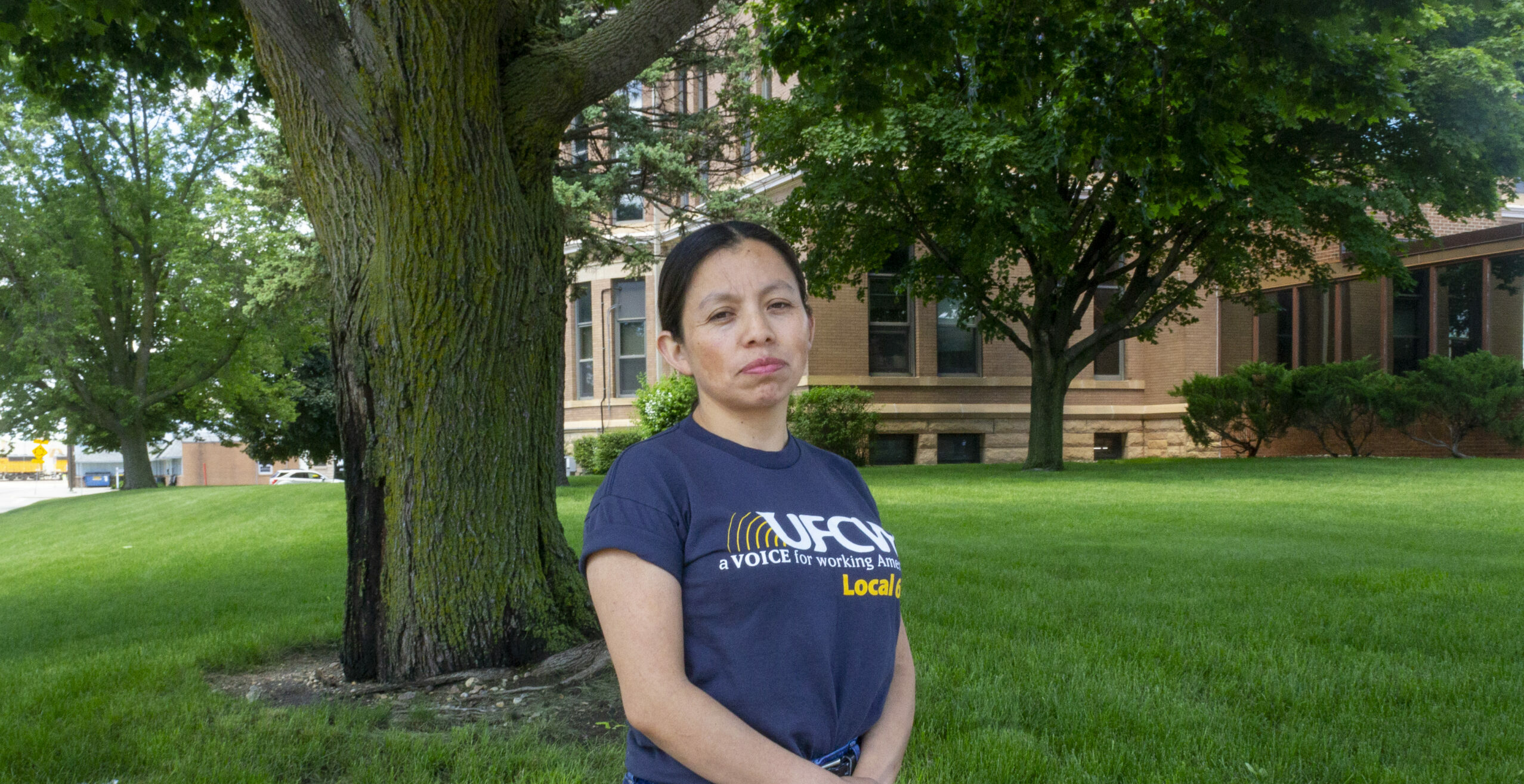 Dina Velasquez Escalante, a meat packer and union steward, poses for a portrait in St. James, Minn., while repping her union, UFCW Local 663.