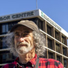 Steve Share poses for a photo in front of the United Labor Center in Minneapolis.