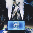 An in-house audio-visual camera operator on the job at a Minnesota Timberwolves home game at the Target Center in Minneapolis.