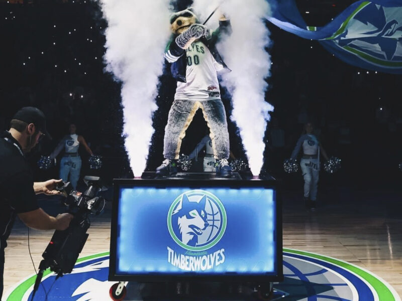 An in-house audio-visual camera operator on the job at a Minnesota Timberwolves home game at the Target Center in Minneapolis.