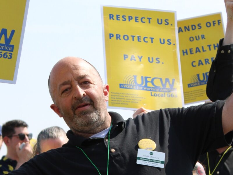 Ryan Christensen, a grocery store worker at Lunds & Byerlys for the past 38 years at a rally.
