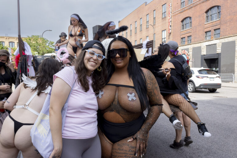 Janette Zahia Corcelius, an organizer with the Minneapolis Teachers Union and Athena Papagiannopoulos, the executive director SWOP MPLS, smile for a photo.