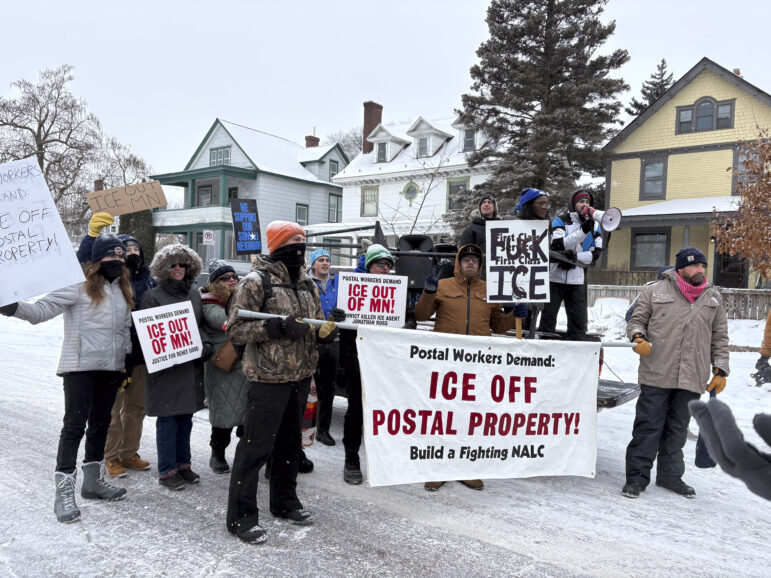 Twin Cities postal workers with the National Association of Letter Carriers (NALC) Branch 9 gathered at the post office on Lake Street in South Minneapolis to demand ICE discontinue its use of postal property and that ICE leave Minnesota.