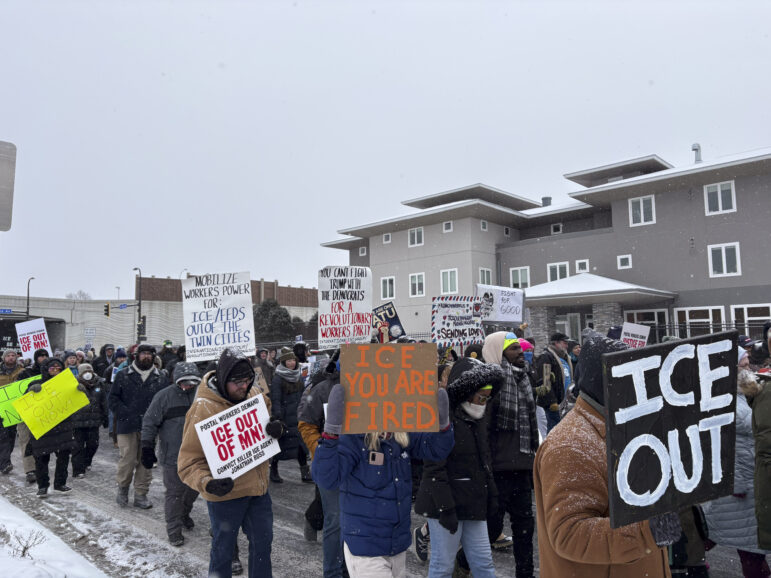 The crowd of over 200 union members and allies marched down Lake Street to the block where Renee Good was shot and killed by ICE agent Jonathon Ross a few weeks before. 